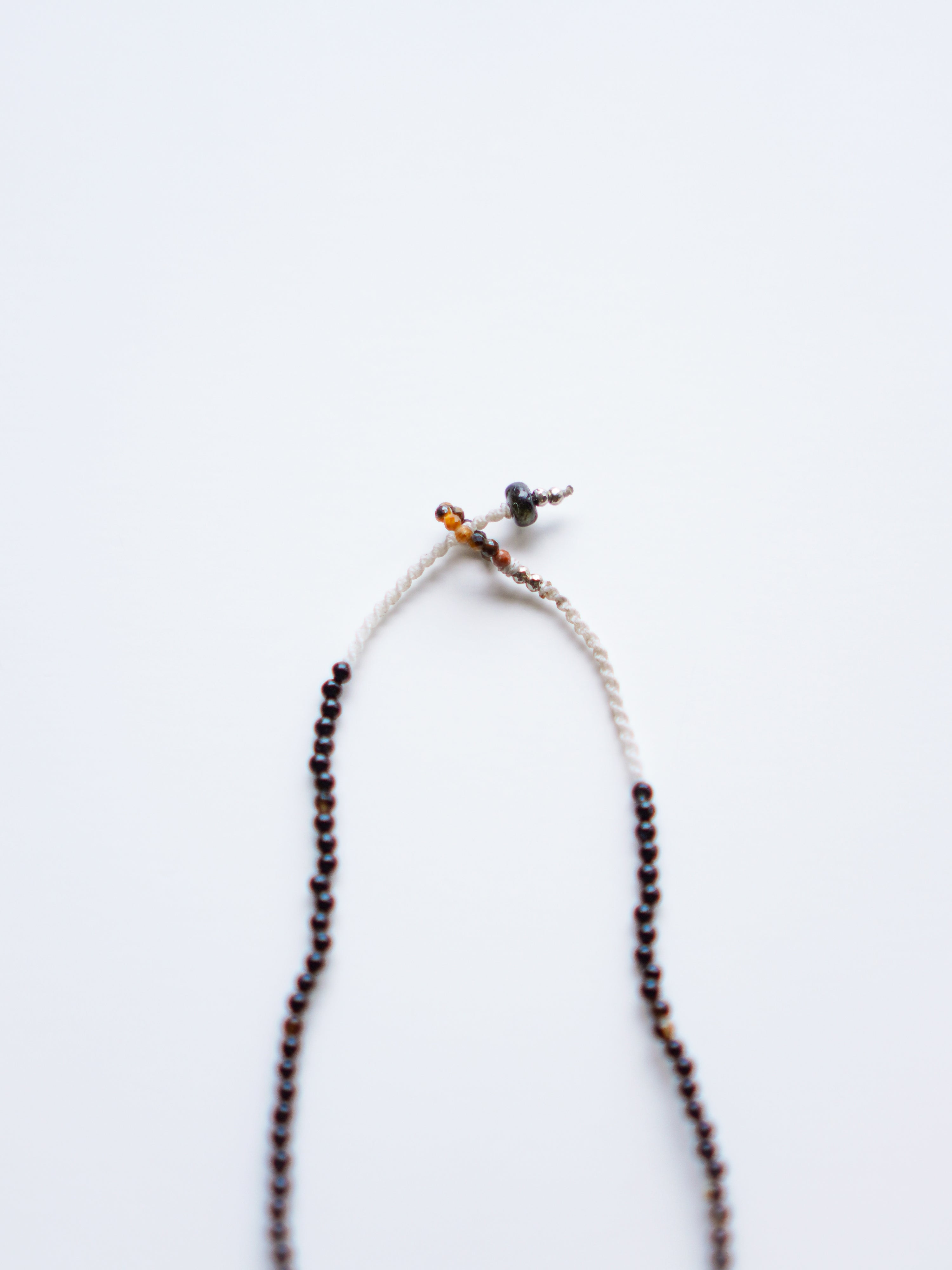 "Spindle Wheel Twins"Necklace. c/# Tiger Eye