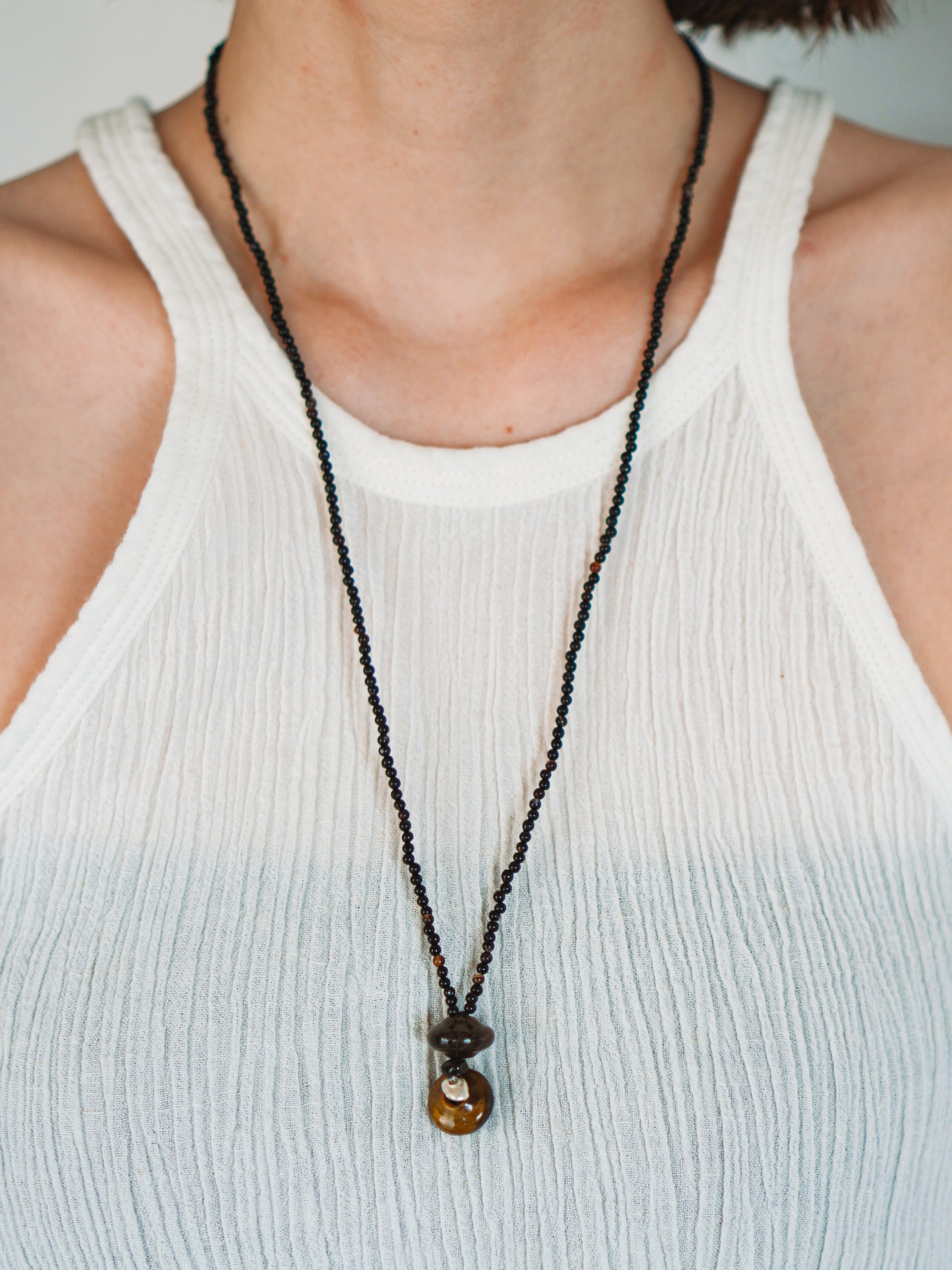 "Spindle Wheel Twins"Necklace. c/# Tiger Eye
